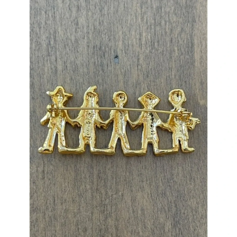 Five Gold-Tone‎ Figures Holding Hands Brooch